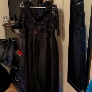 Long sleeve black lace dress.